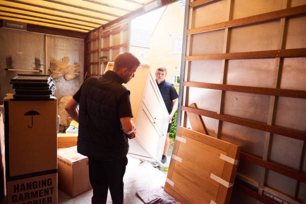 Forward Thinking Movers loading furniture into a moving truck on a labor-only job